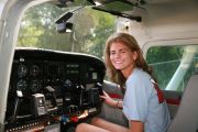 Girl in Cessna 182 cockpit